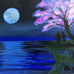 Romantic couple sitting under Jacaranda tree